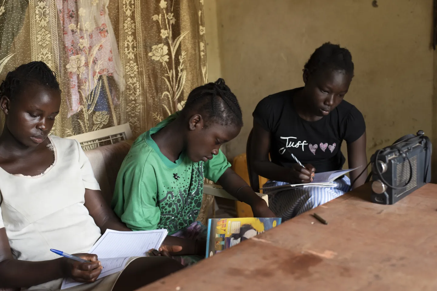 Three young people are studying