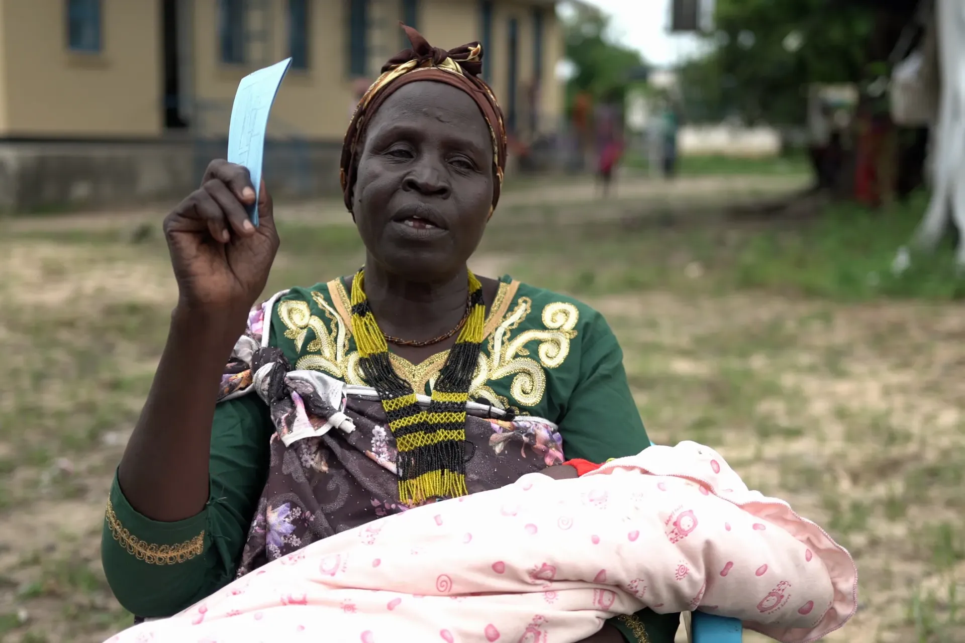 Shamah Joseph is photographed in Pibor at a health facility as she speaking in front of a camera