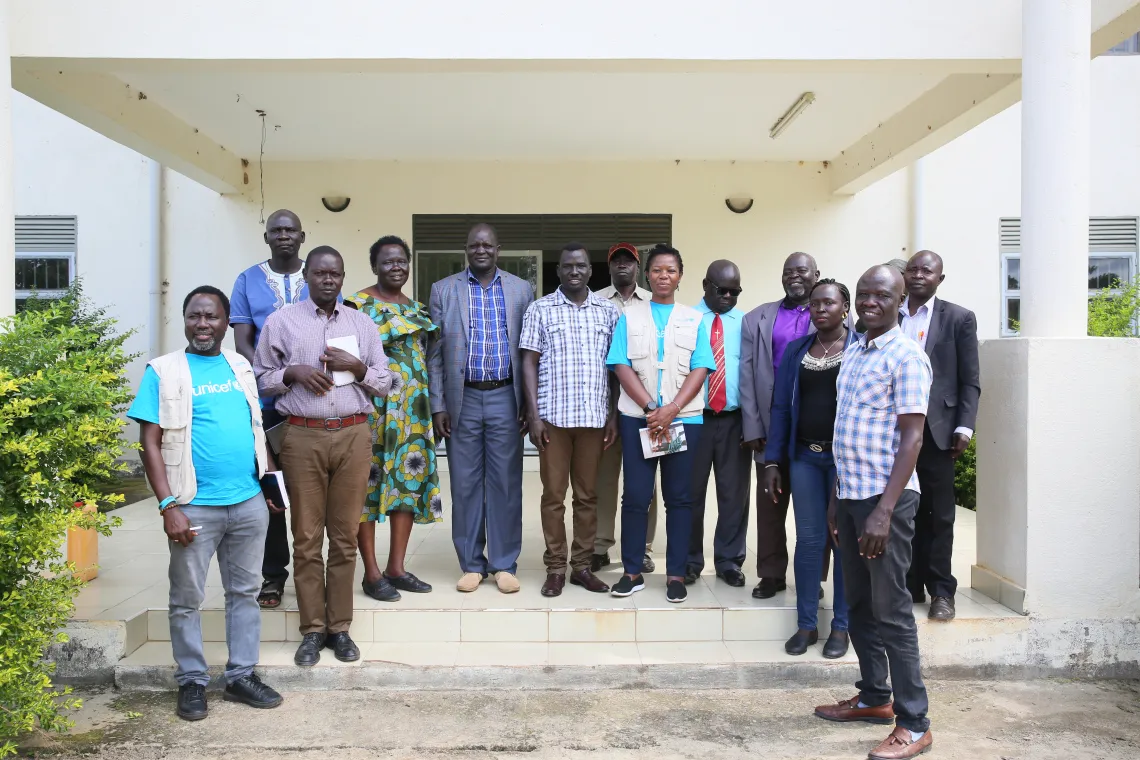 group photo of UNICEF and Ministry of education delegations at the schools handover ceremony in Magwi County, South Sudan
