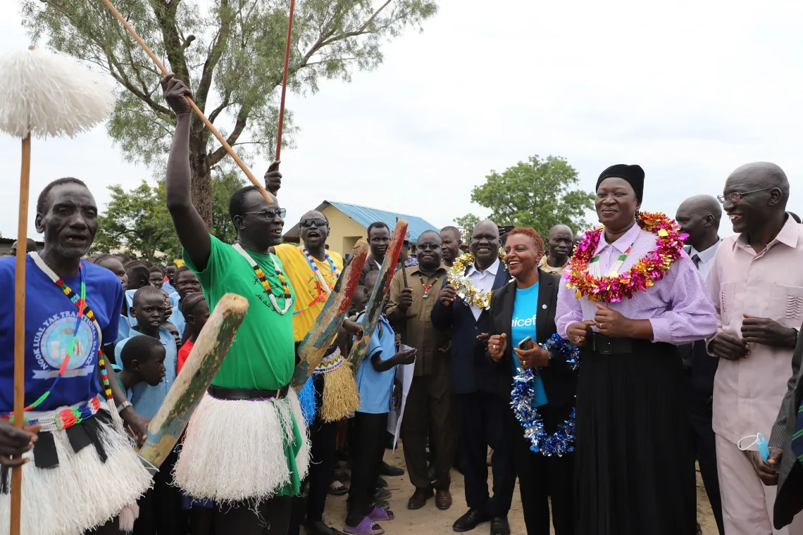 Community members celebrate the inauguration of the school. 