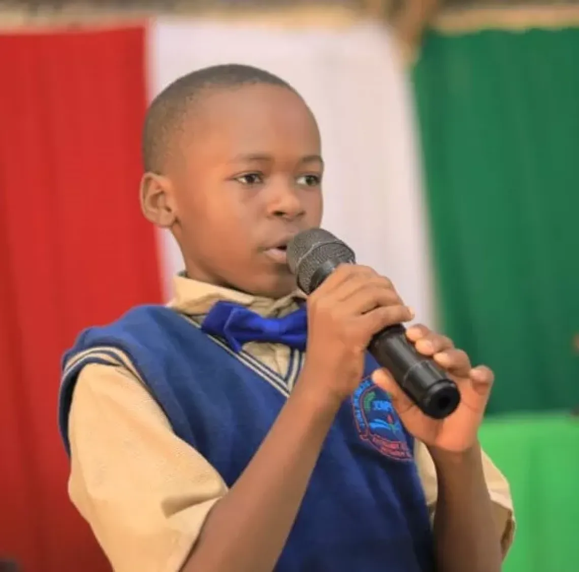 Torosa Julius, a young reporter speaking at an event in Juba, South Sudan