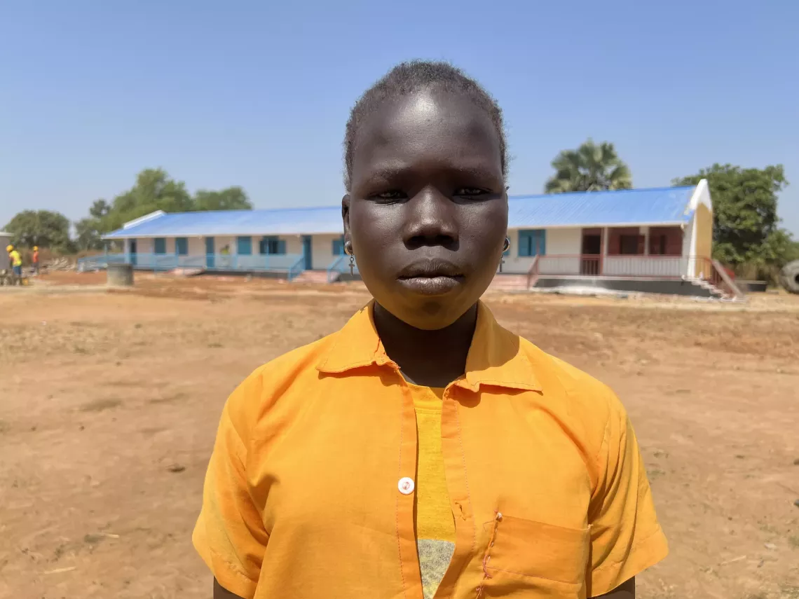 A young girl student is photographed in her primary school.