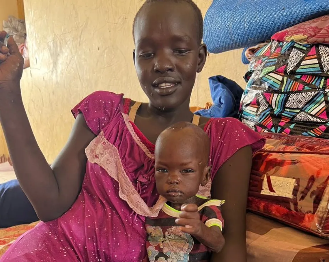 Kamisa and her mother at transit center, Renk, South Sudan supported by UNICEF