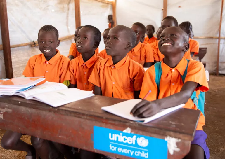 Children sitting in a classroom 