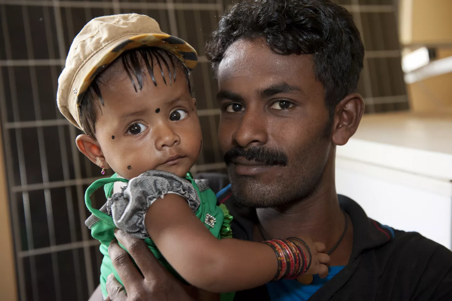 Father carrying his baby