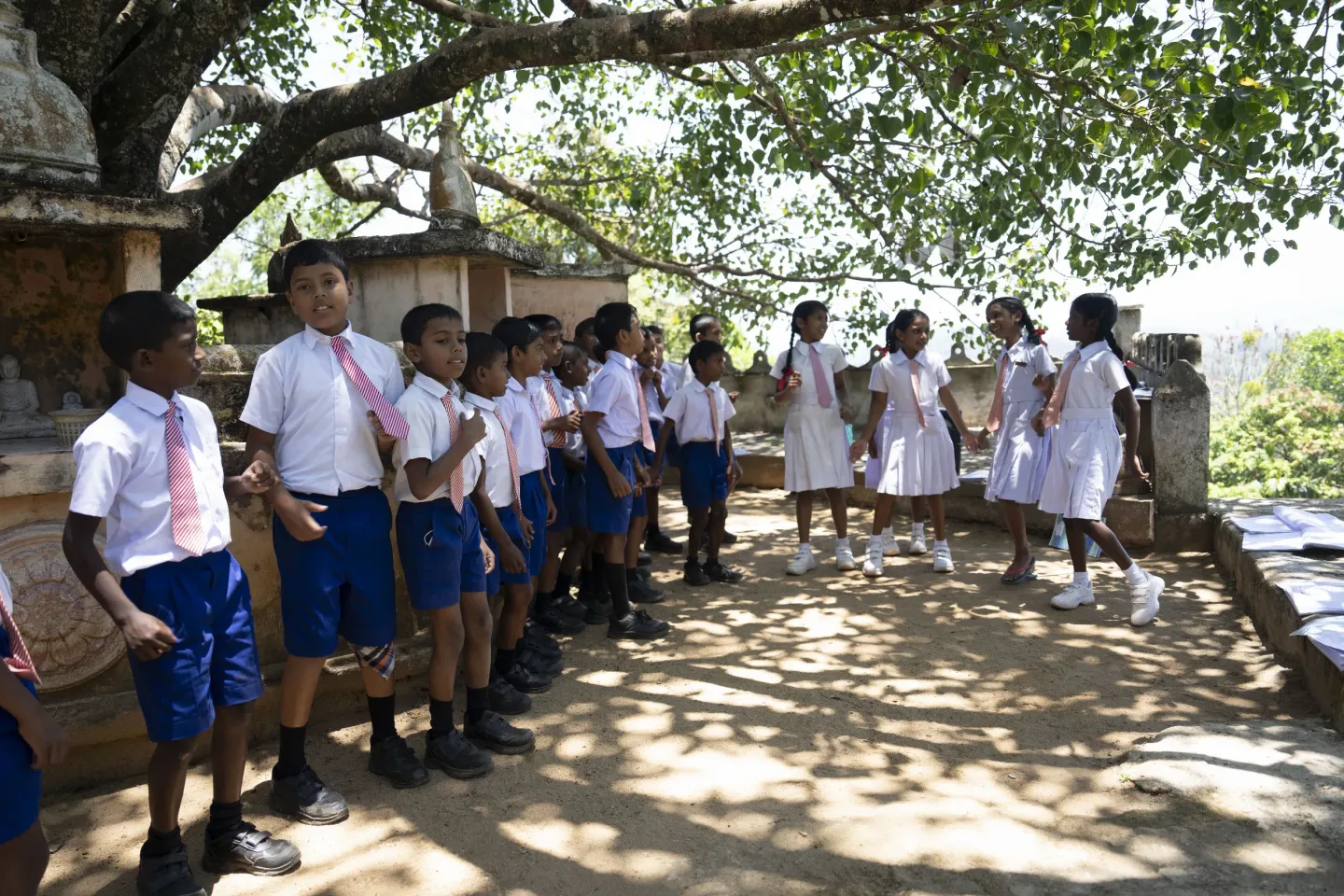 Dancing class held under the temple boo tree due lack of space.