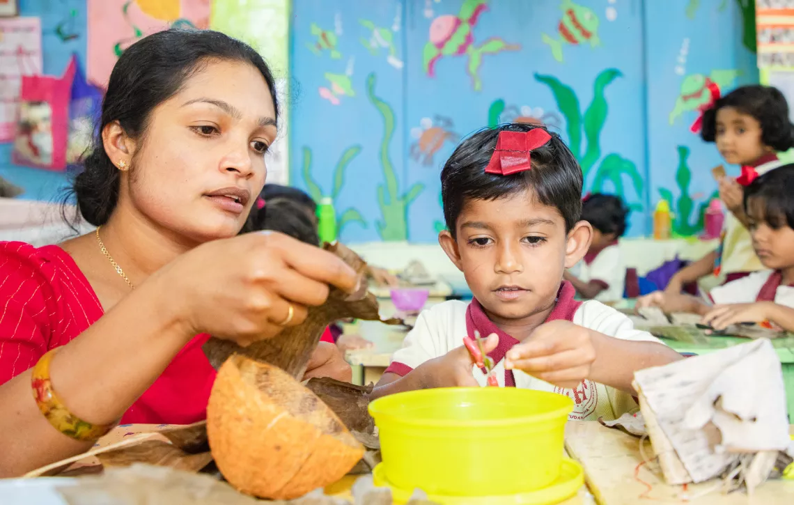 Dinithi with head teacher, Dilrukshi (left)