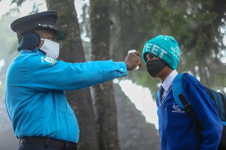 Temperature checks, masks, physical distancing and more are part of the new normal