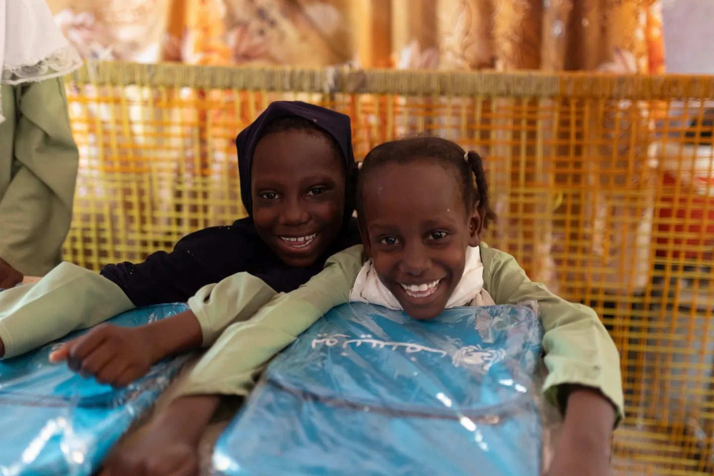 back to school campaign, education supplies, EU, European Union, education in emergencies, UNICEF education supplies, backpacks, notebook, pencils, pens, girls' education, girls, Sudan, UNICEF