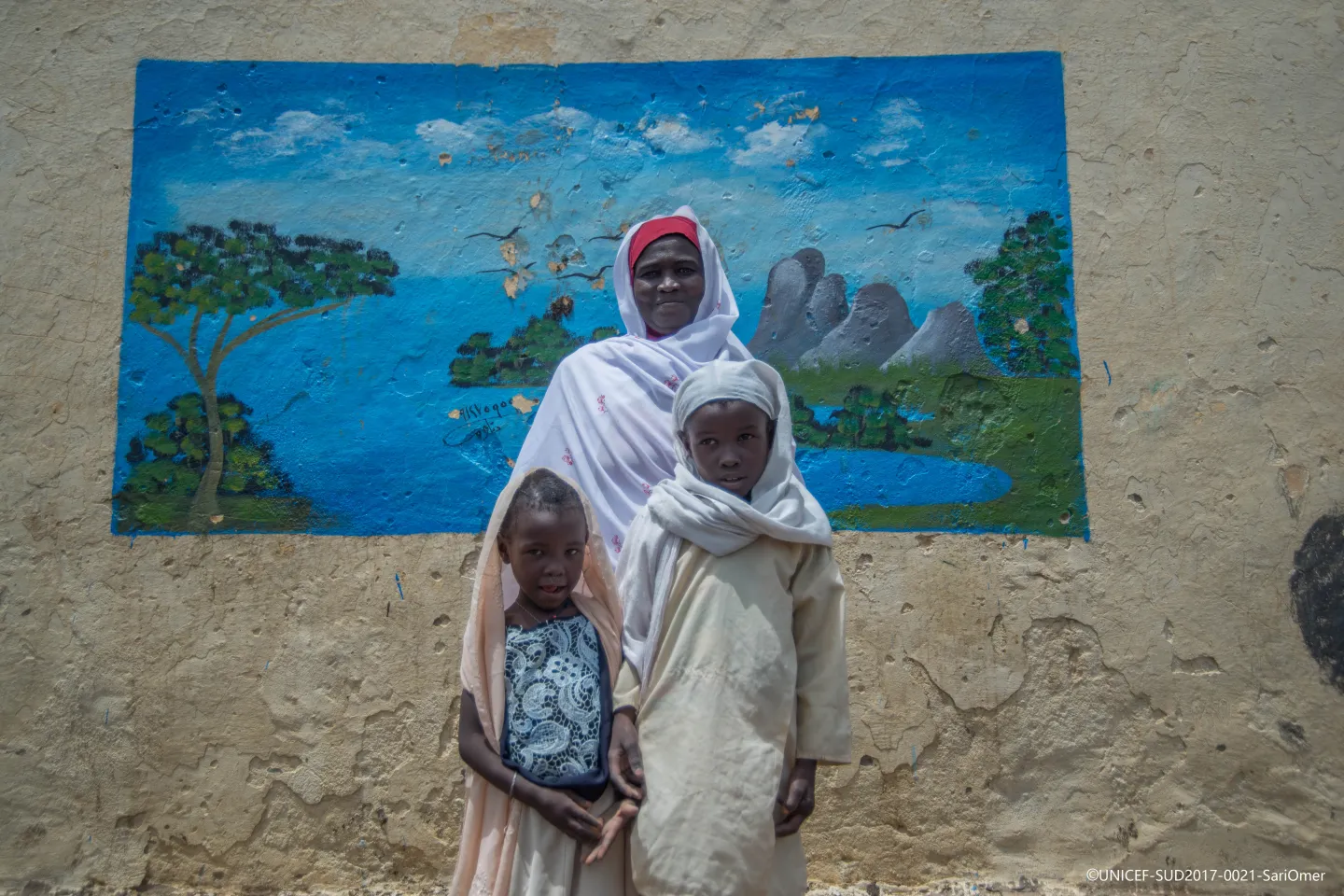 Mother and her two daughters in Sudan