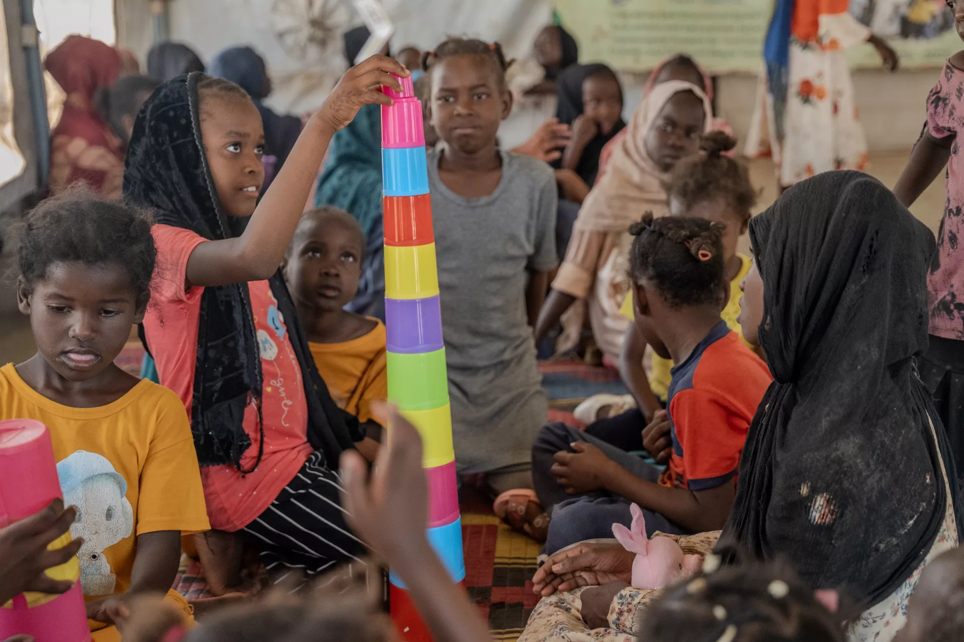 child friendly spaces, CFS, safe environments for children affected by conflict, play, psychosocial support, heal, drawing, Sudan, UNICEF, 