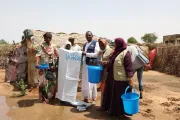 Families affected by the flooding receive relief items from UNICEF partners.