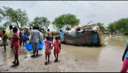 UNICEF partners distribute relief items to families affected by floods.