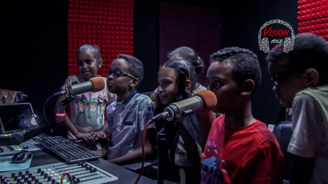 Children taking over the aiwaves in Vision 101.3 FM Radio station. 