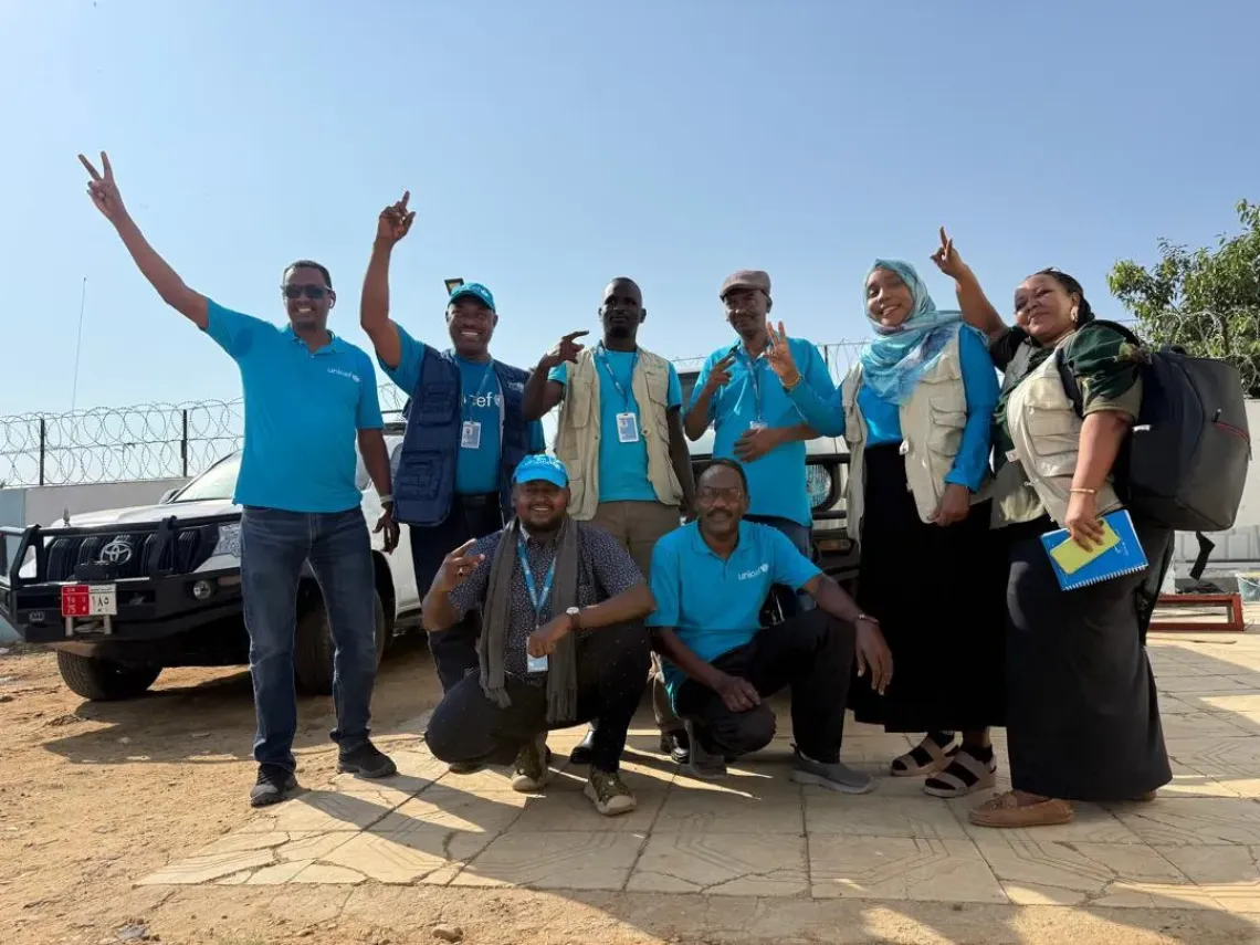 UNICEF SBC Officer (extreme right) Nasrin Ibnouf and other colleagues prepare for a field mission.