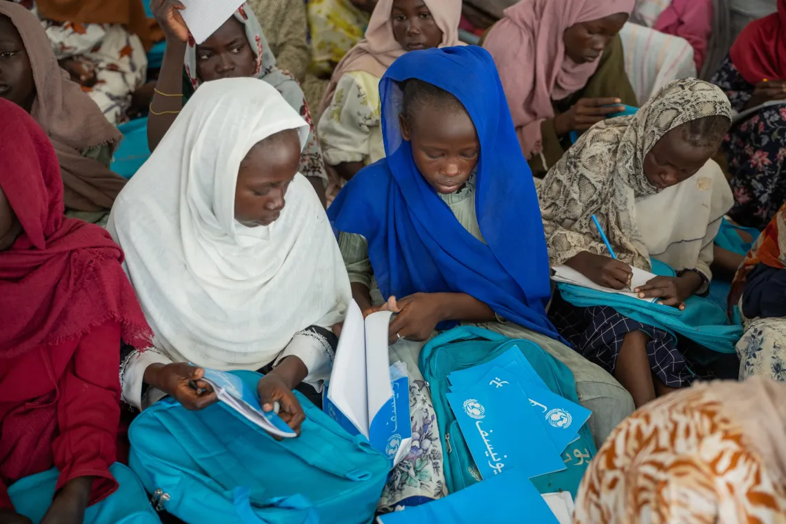14-year-old Mariam prepares to write notes at the UNICEF-supported Alternative Learning Programme (ALP) centre in Goaz Salam internally displaced persons (IDP) Camp in Kosti, White Nile State.