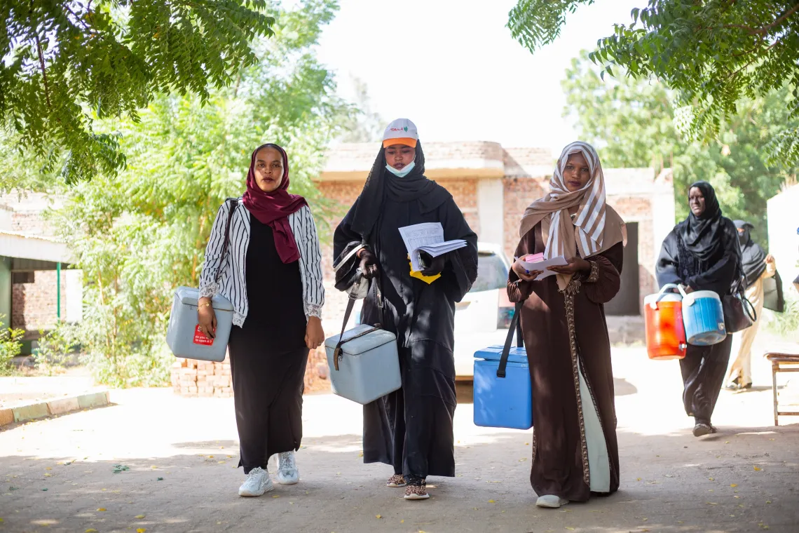 Vaccinators prepare to traverse communities during a campaign.