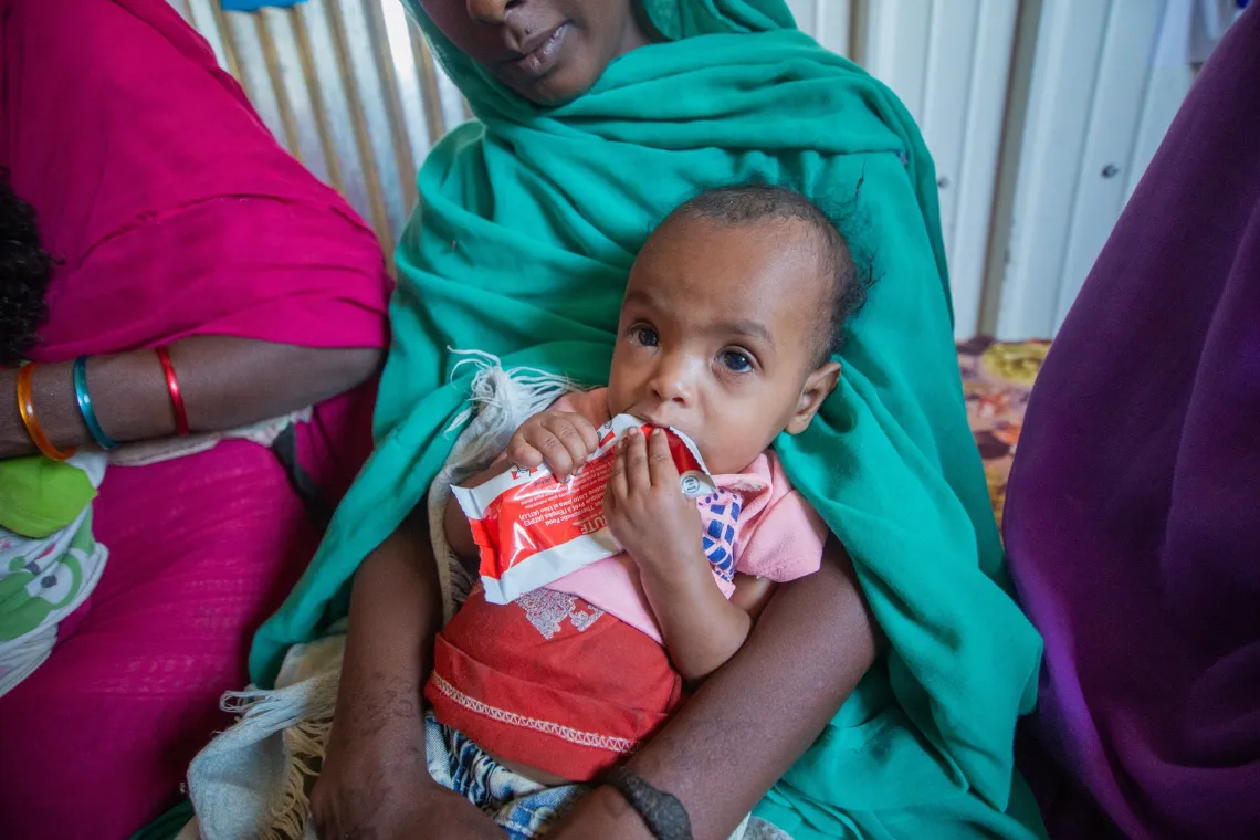 MUAC screening, mid-upper arm circumference, severe acute malnutrition, malnutrition, nutrition, conflict, displaced children, poor diets, poor meals, complementary feeding, RUTF, ready to use therapeutic food, UKAID, UNICEF, war, conflict