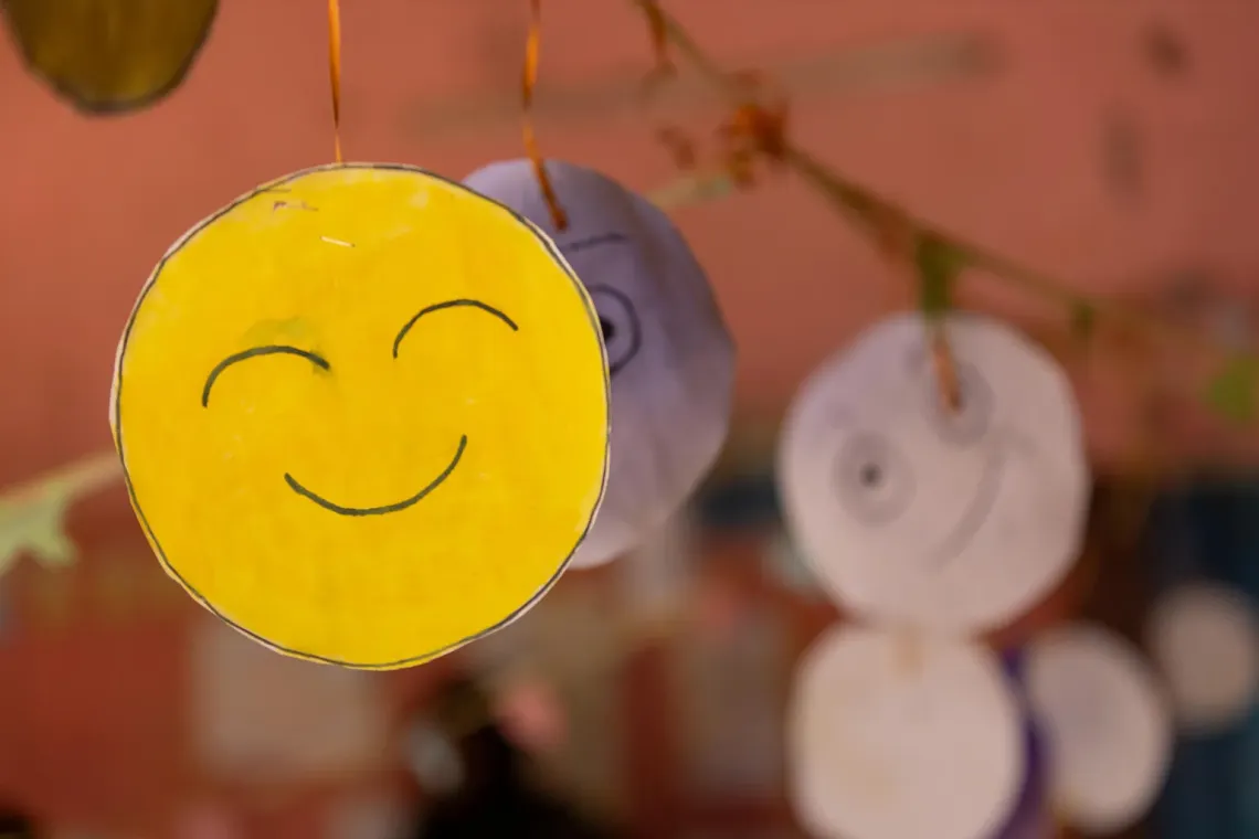A smiley cut out by children at the UNICEF supported child friendly space.