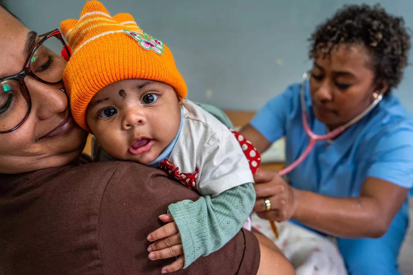 A nurse A nurse performs a health check on a baby at the Colonial War Memorial Hospital in Suva, Fiji.