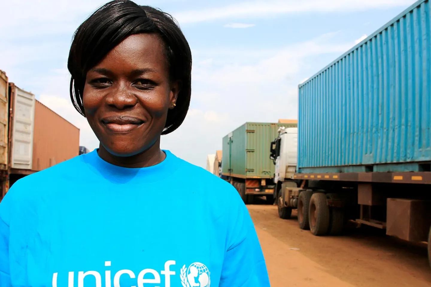 Victoria Kiko, a senior warehouse assistant for UNICEF in South Sudan, stands in the town of Kiech Kon in Upper Nile State &ndash; where UNICEF and partner organisations have deployed a rapid response team to assist displaced people in remote and hard-to-reach areas affected by the conflict, in August 2014.