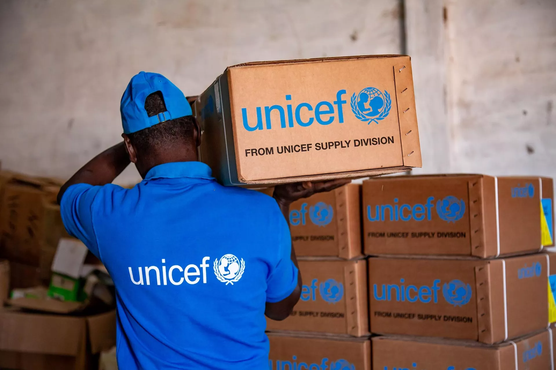 Supplies reach their destination country to be distributed to children and their families, completing their journey.