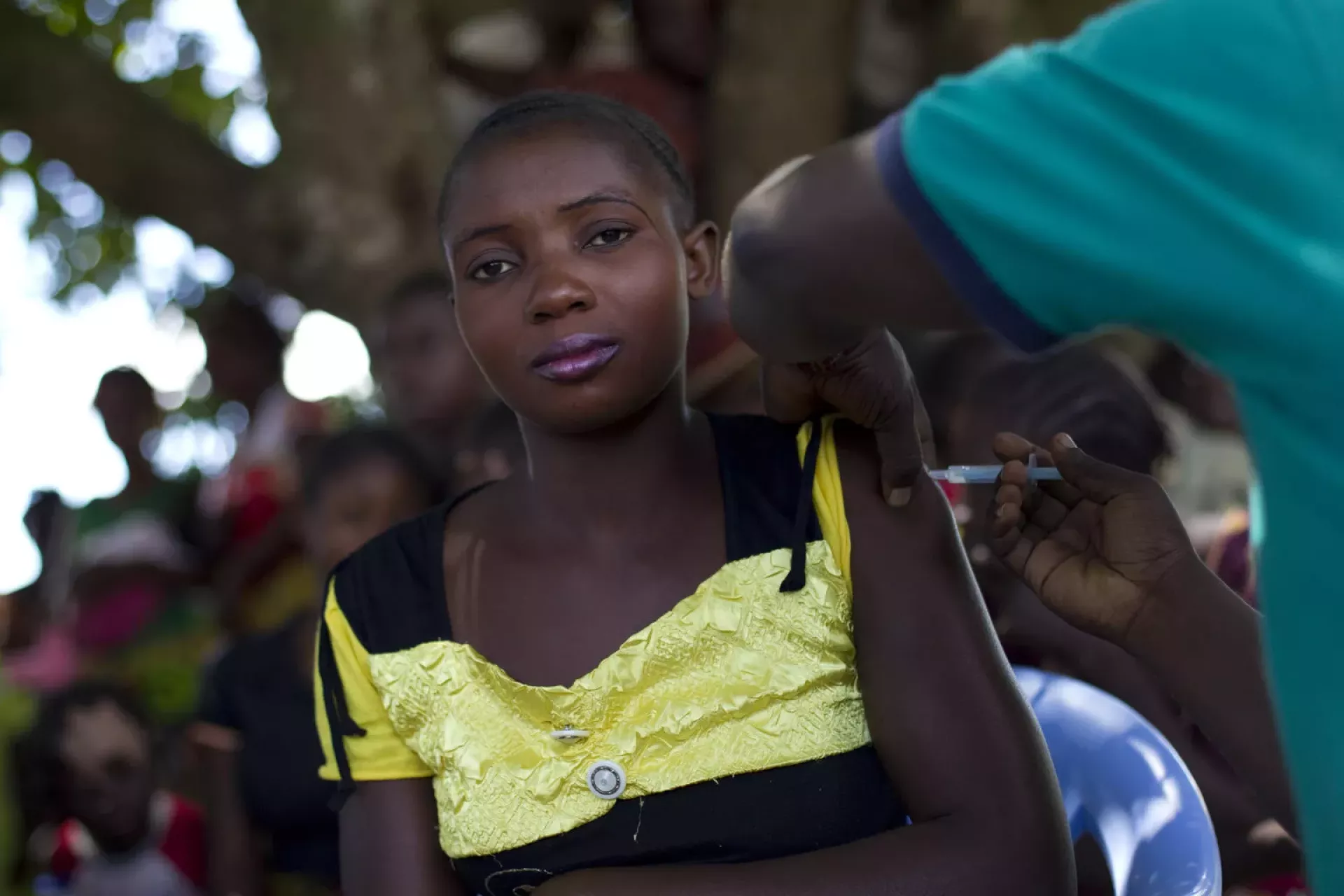 Girl being vaccinated against tetanus 