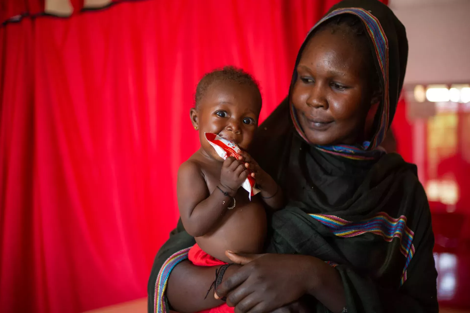 Mother holding a child 