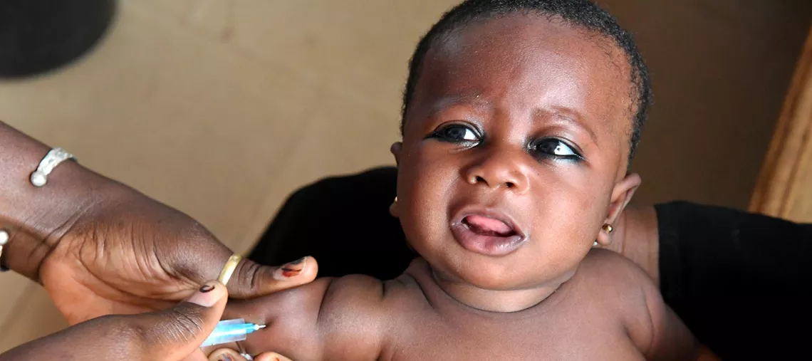 A baby is being vaccinated in a health center in Man, in the Northwest of C&ocirc;te d'Ivoire, in February 2020.