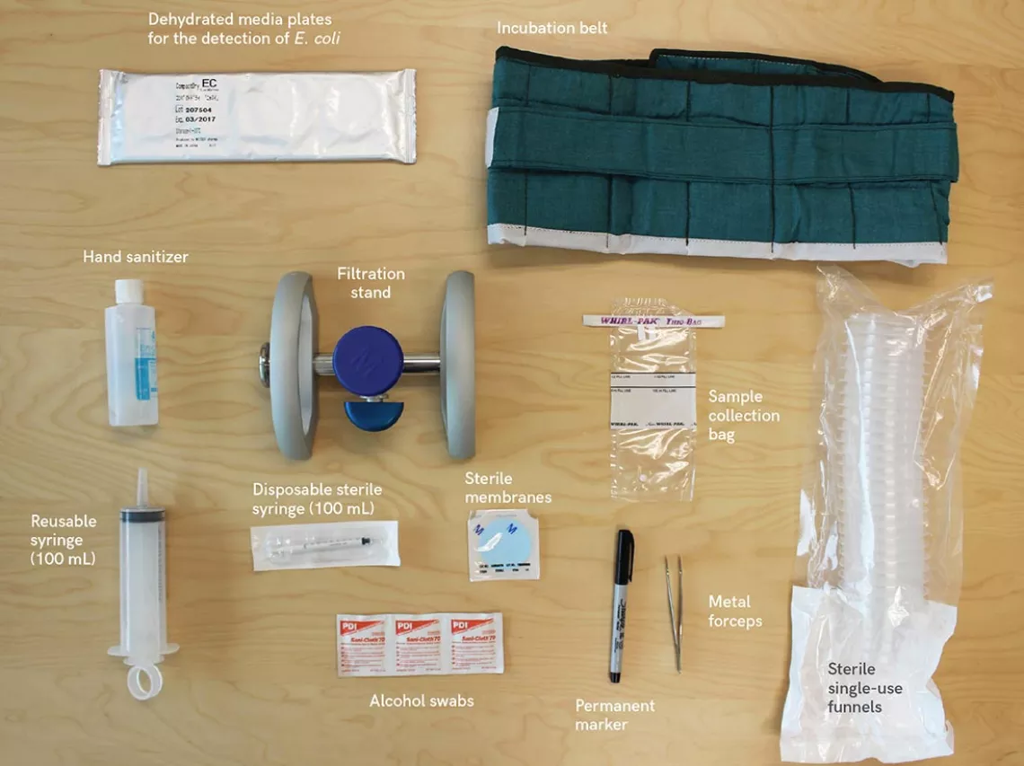 A water quality testing kit, including the belt (top right) worn by surveyors for 24 hours straight to incubate samples with their body heat.
