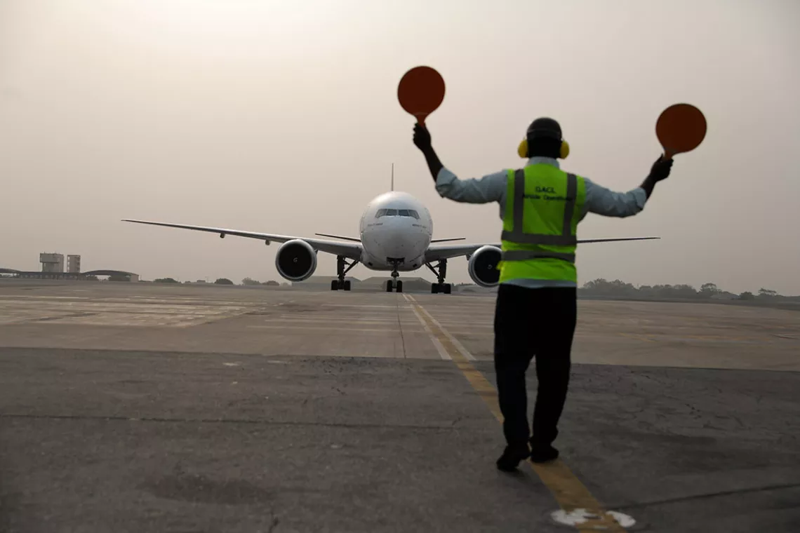 On 24 February 2021, a plane carrying the first shipment of COVID-19 vaccines distributed by the COVAX Facility lands at Kotoka International Airport in Accra, Ghana's capital.