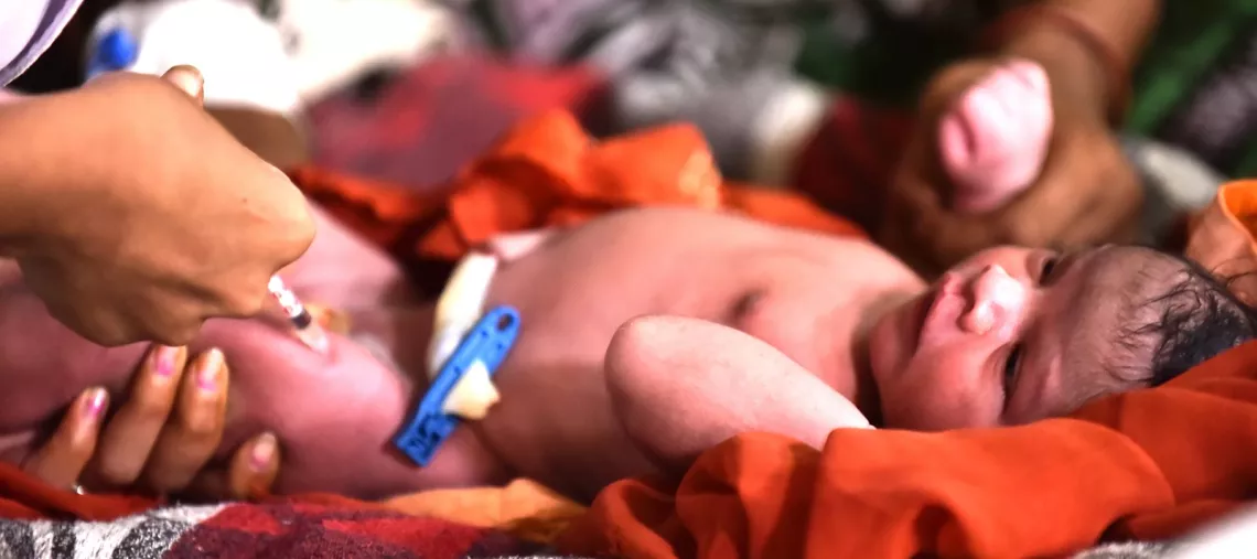 A one-day baby girls is vaccinated in a sub-district hospital in Kurkhera Town, District Gadchiroli, Maharashtra, India.