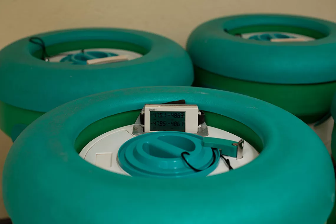 Temperature-controlled smart containers used in the transportation of vaccines are prepared to receive the first COVID-19 vaccines at Rwanda&rsquo;s Central Vaccine Storage facility, located in Kigali, on 4 February 2021. 