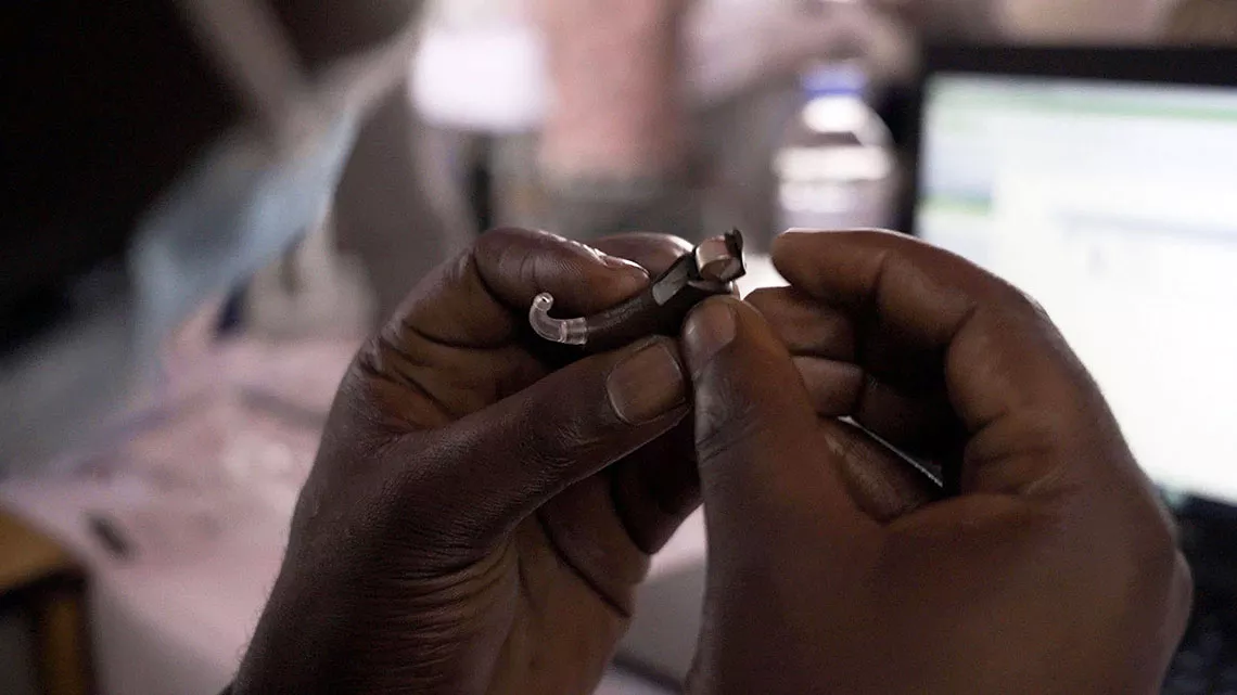 A pre-programmable behind-the-ear hearing aid supplied by UNICEF.