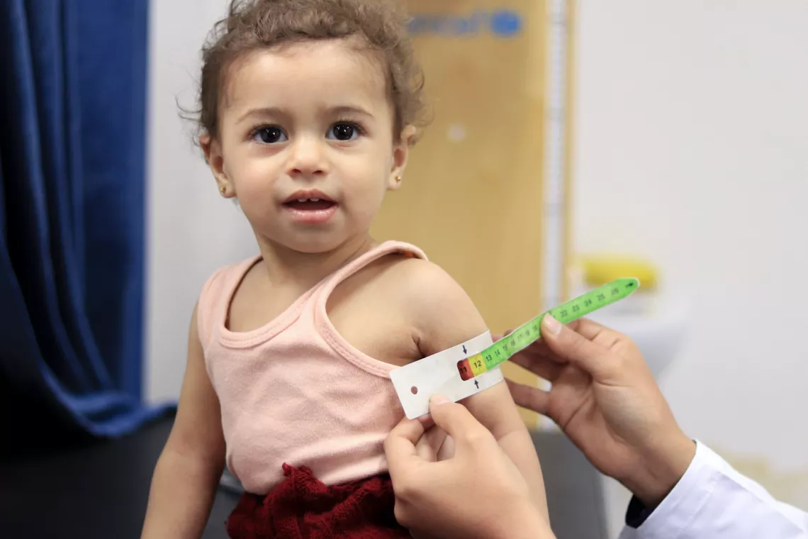 One-year-old Alia at a health clinic in Syria