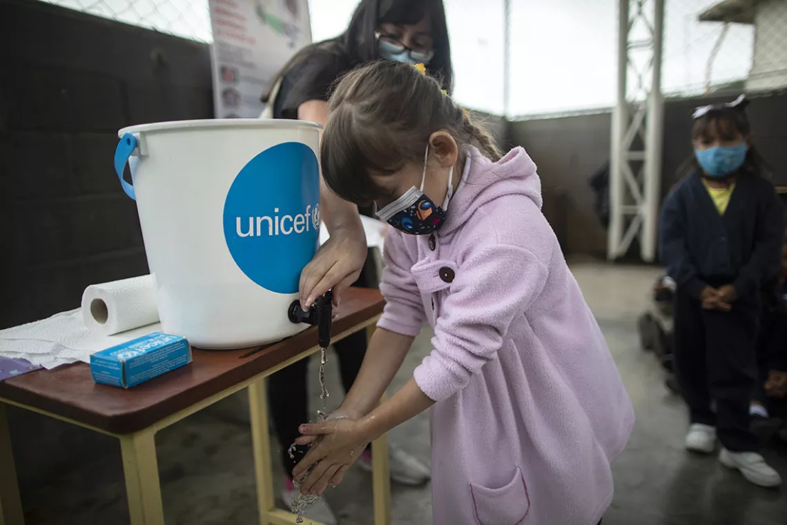 A girl washes her hands during Global Water Day activity in a school in Caracas, Venezuela in March 22.