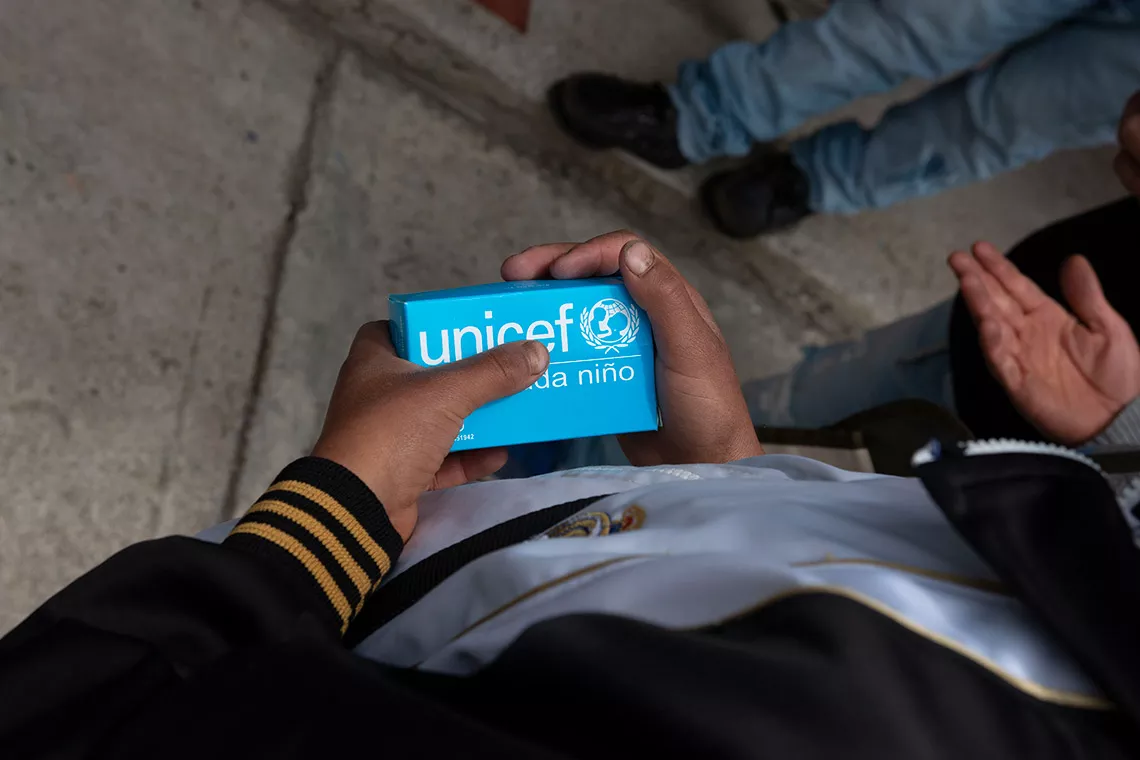 A child holds a bar of soap delivered by UNICEF to his school in Gavidia community, located in M&eacute;rida state, Venezuela. 