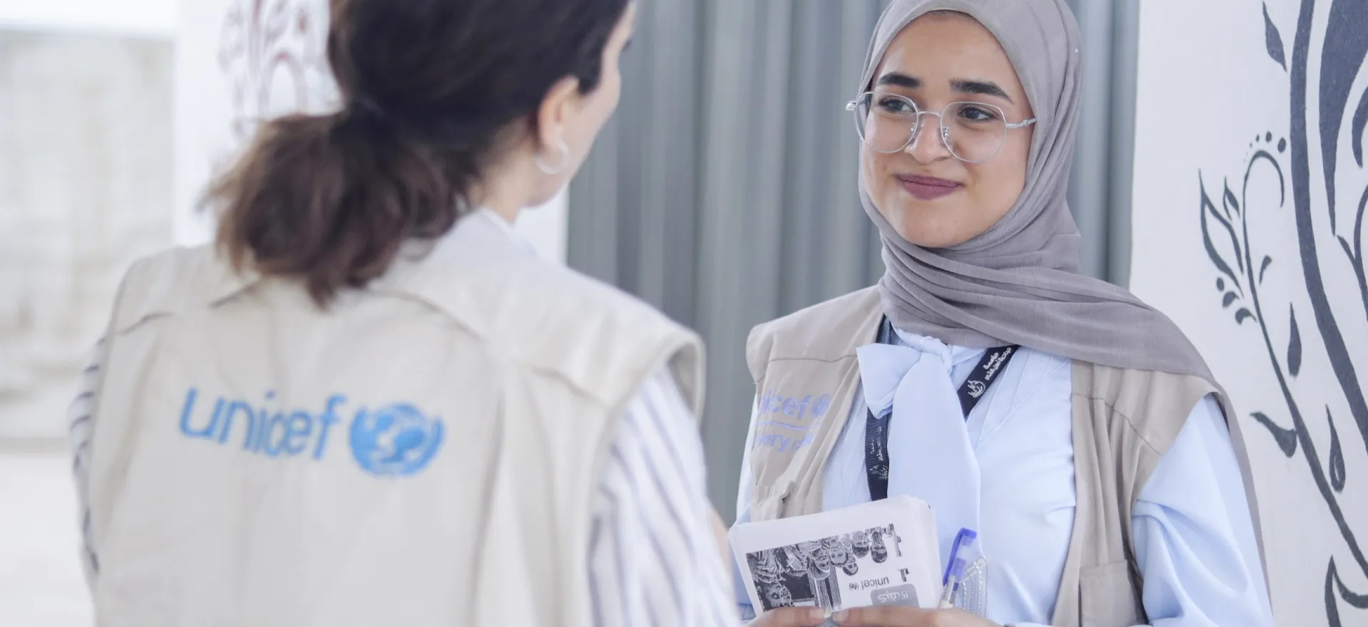 Farah, 21, speaks with the UNICEF protection from sexual exploitation and abuse (PSEA) focal point from the Damascus Field Office.