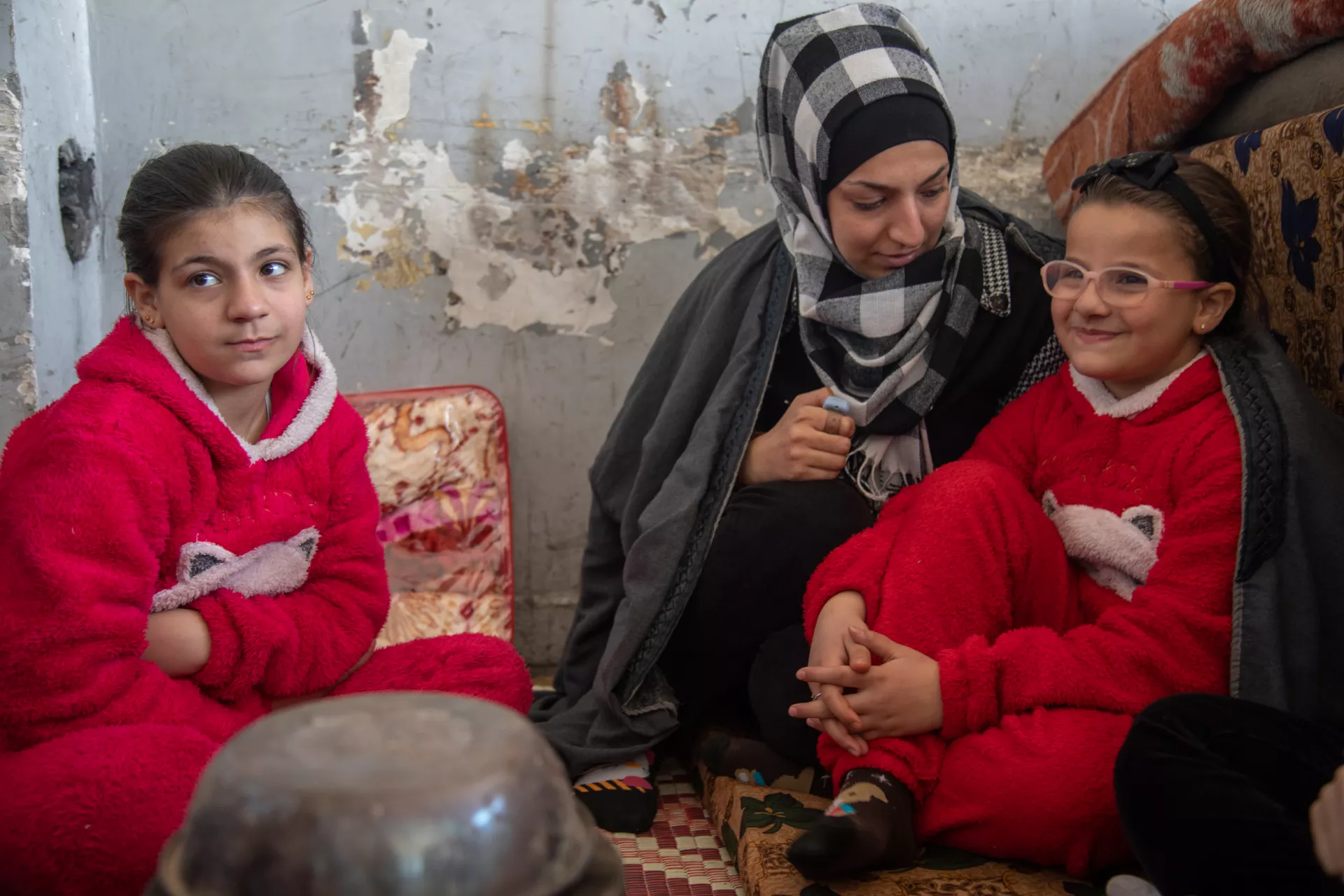 10-year-old Judy is staying with her mother and sister in a temporary shelter located in Aleppo city.