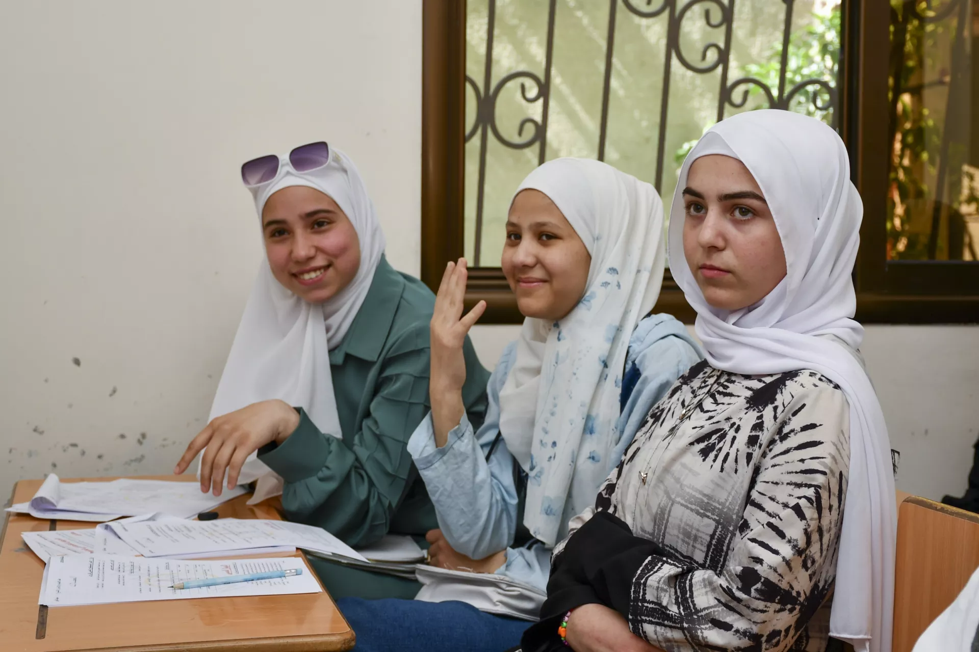 Azhar, 16, and Sham, 16, revise their lessons together during a Grade 9 science class at a UNICEF-supported self-learning centre in Rural Damascus.