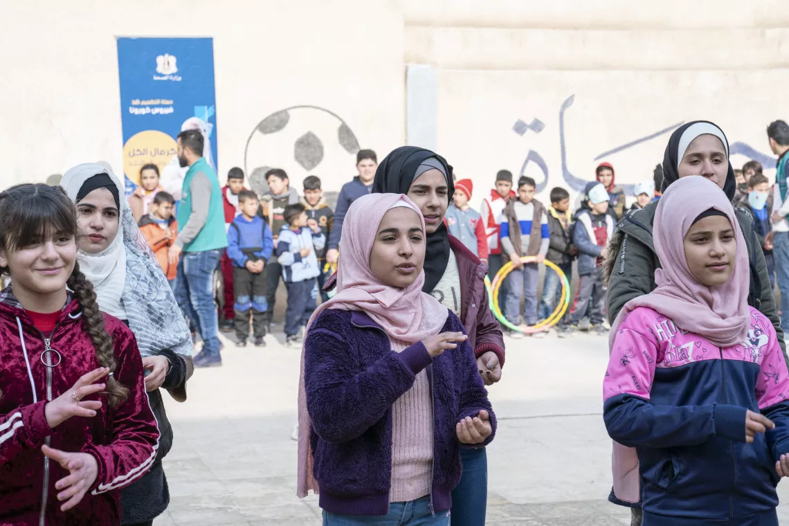 children lining up outside
