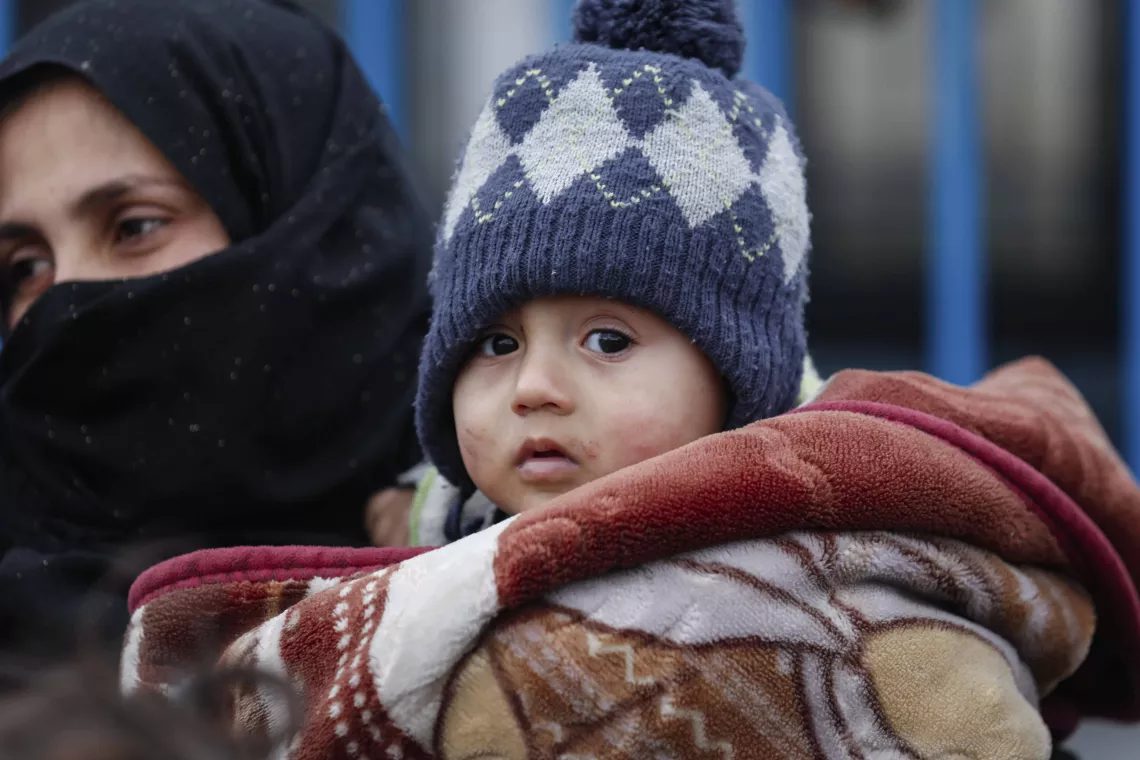child wearing a wool hat