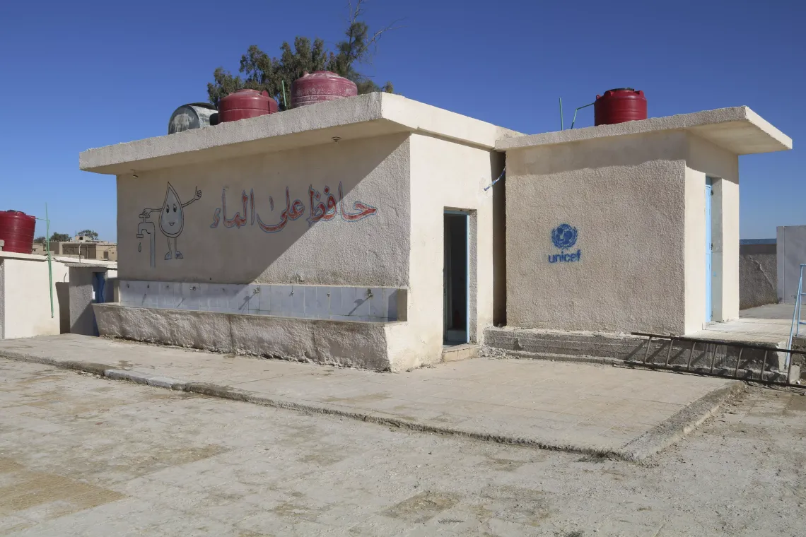 Newly renovated toilets and drinking water point at the school