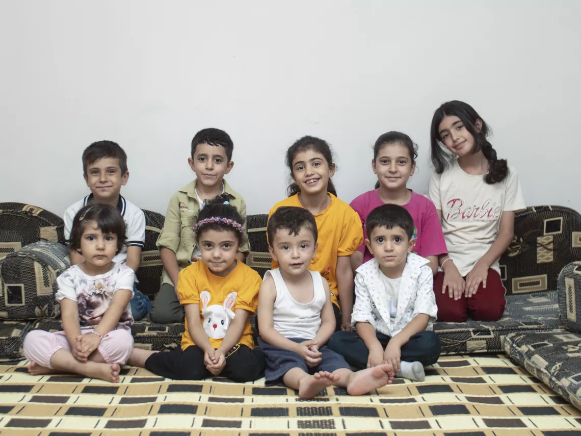 Leila&rsquo;s grandchildren pose for a group photo at their grandparents' house in Western gathering, Kisweh city, Rural Damascus.