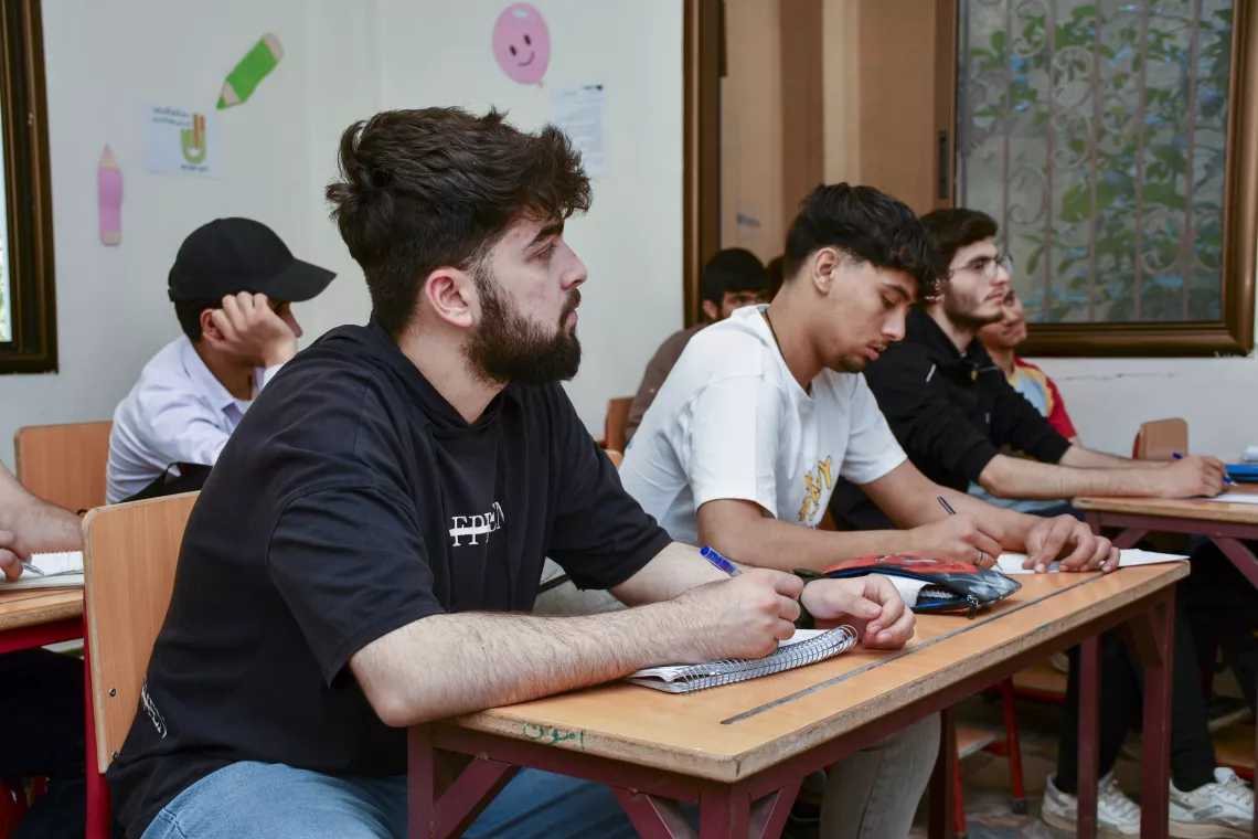 Khalil, 19, and Farouk, 18, take part in a mathematics revision session.