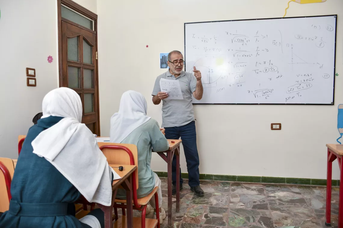 Mr. Mahmoud teaches physics to 12th-grade students.