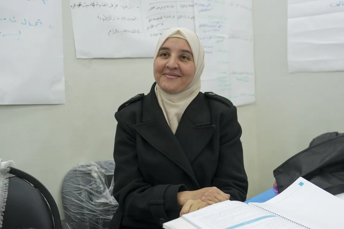 Portrait of a smiling woman.