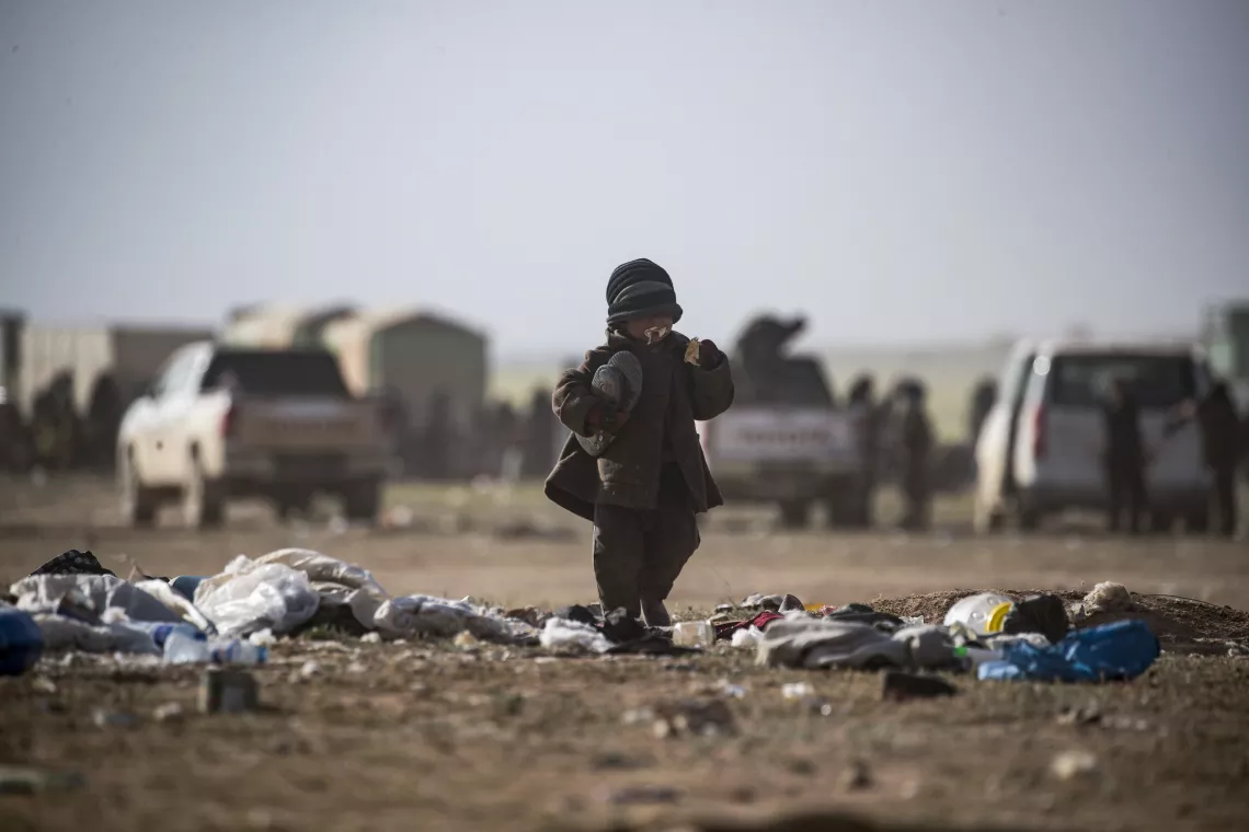 child fleeing in the desert