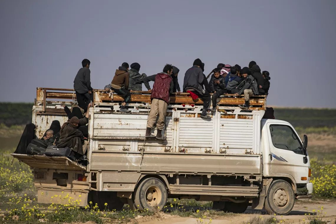 IDPs fleeing in truck