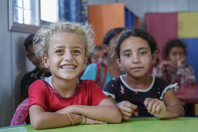 Nour, 5, at the early childhood education class at the UNICEF-supported non-formal education centre in Areesha camp, Al-Hassakeh governorate.